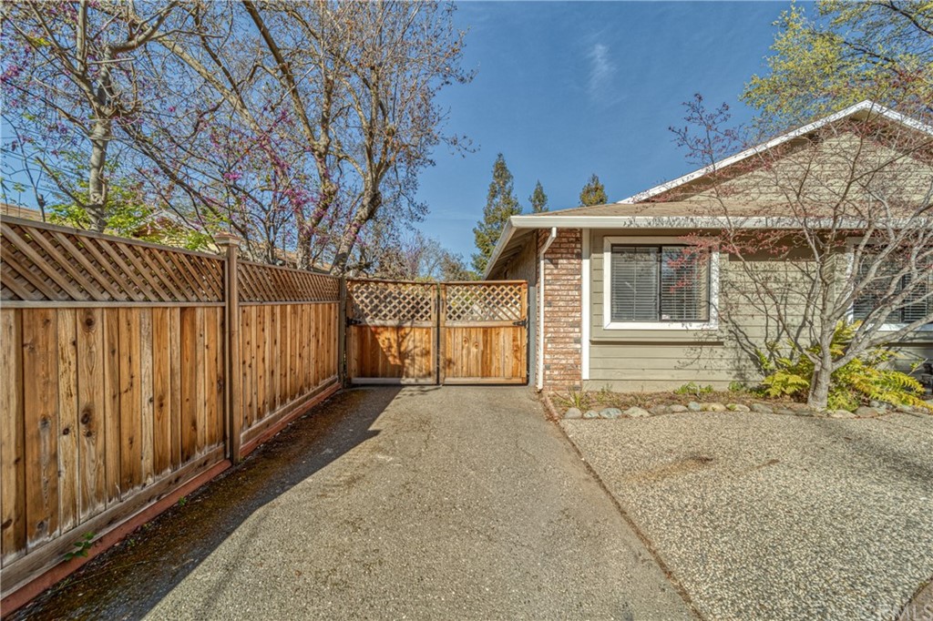 704 Miller Avenue Chico, CA 95928 - Photo 37 of 38 a front view of a house with a yard and garage
