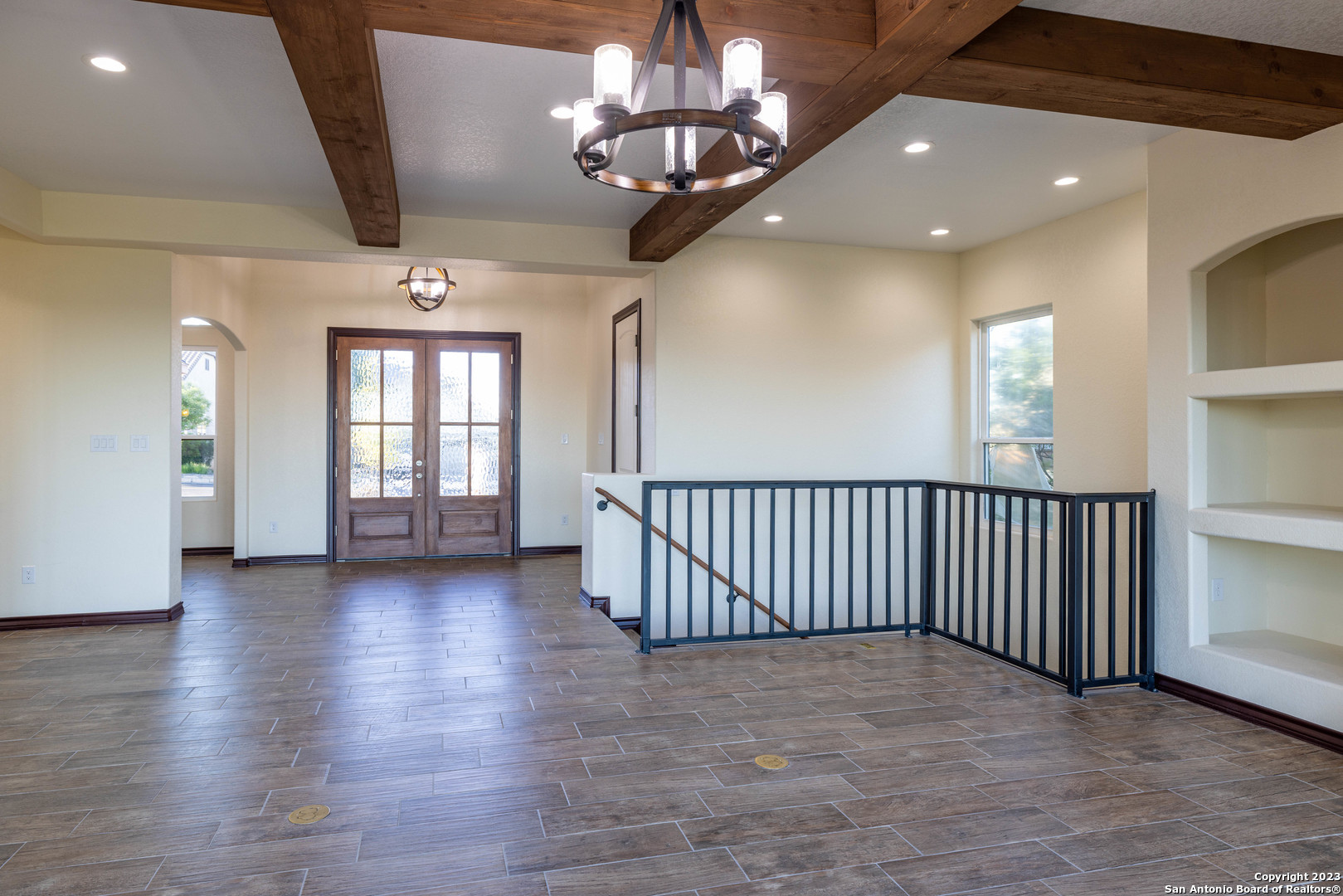 86 Hannah Lane Boerne, TX 78006 - Photo 15 of 45 an empty room with wooden floor and windows