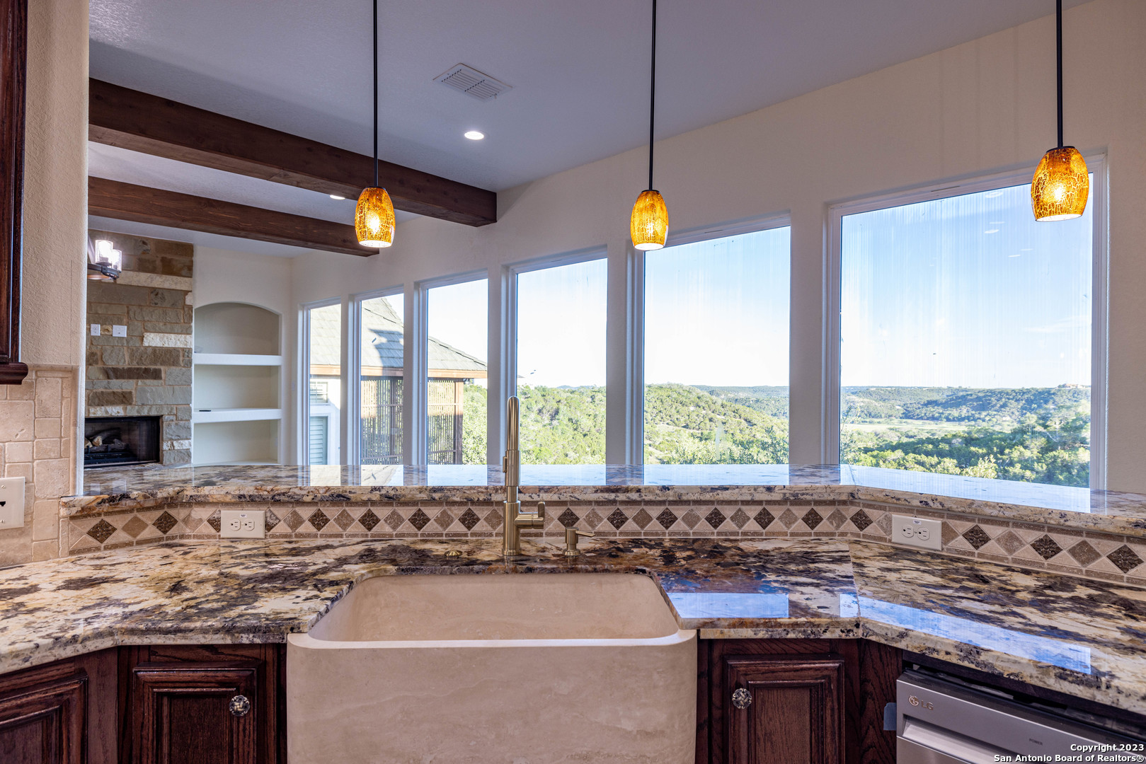86 Hannah Lane Boerne, TX 78006 - Photo 19 of 45 a kitchen with a sink and a counter top space