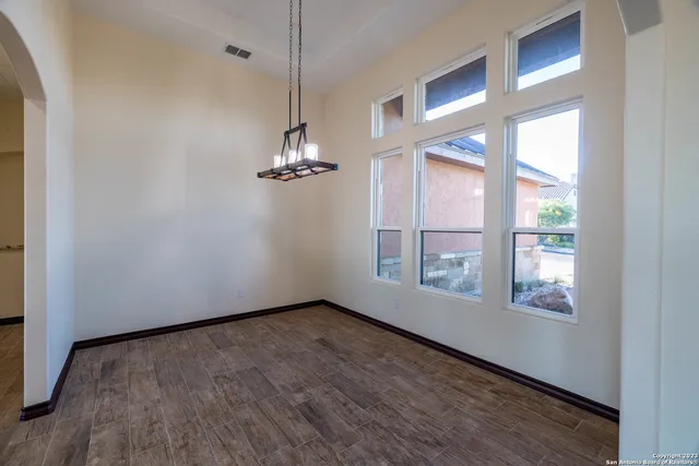 an empty room with windows