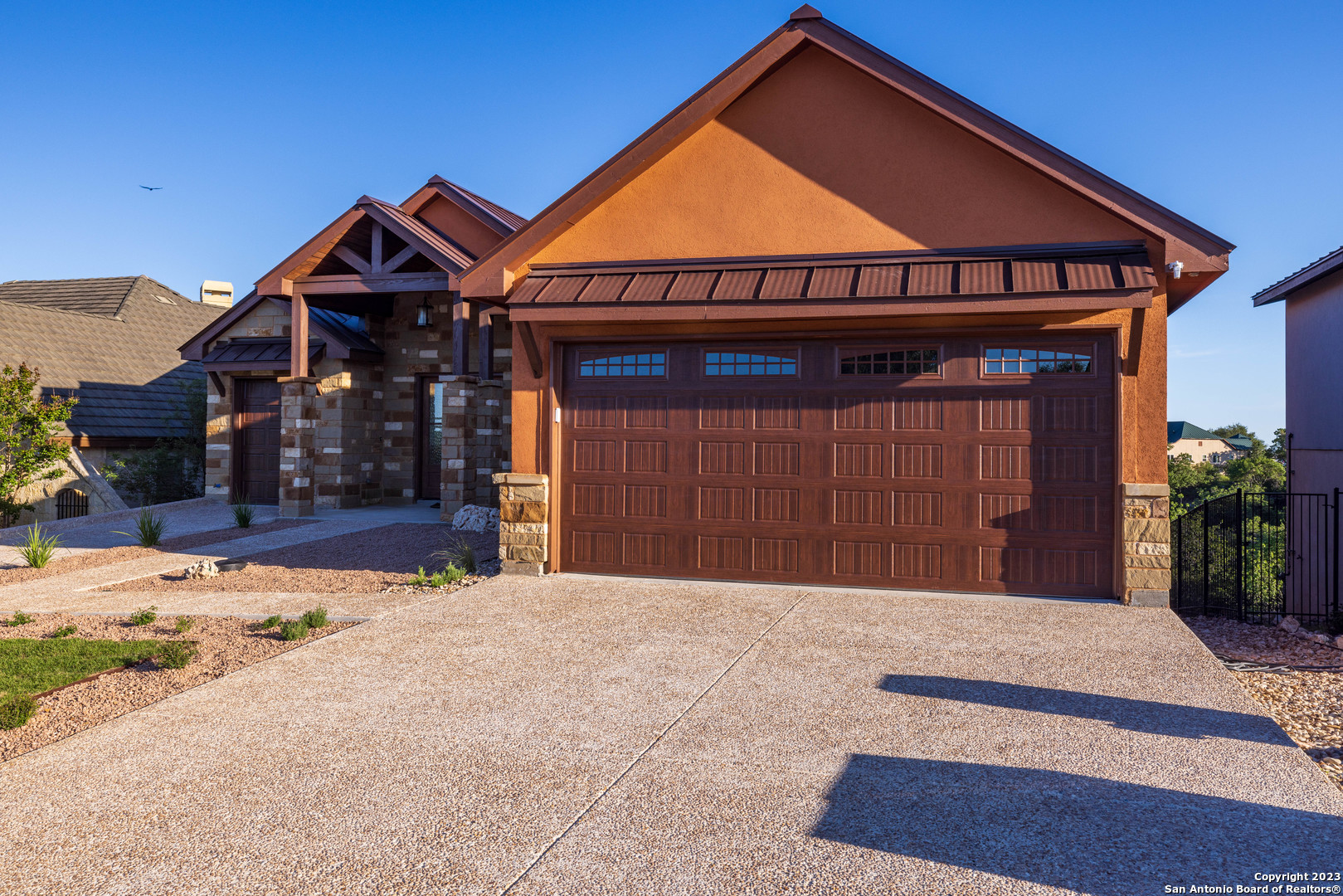 86 Hannah Lane Boerne, TX 78006 - Photo 3 of 45 a front view of a house with a yard and garage