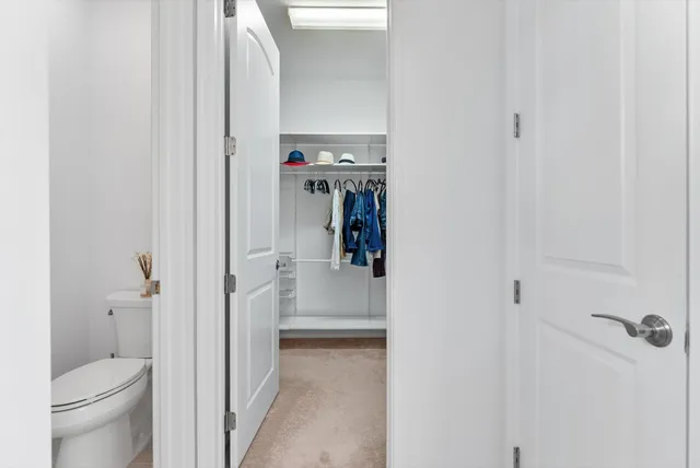 a bathroom with a toilet and a sink