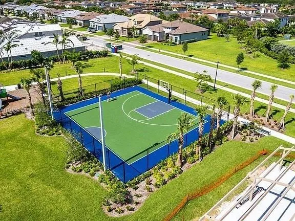 an aerial view of a tennis ground