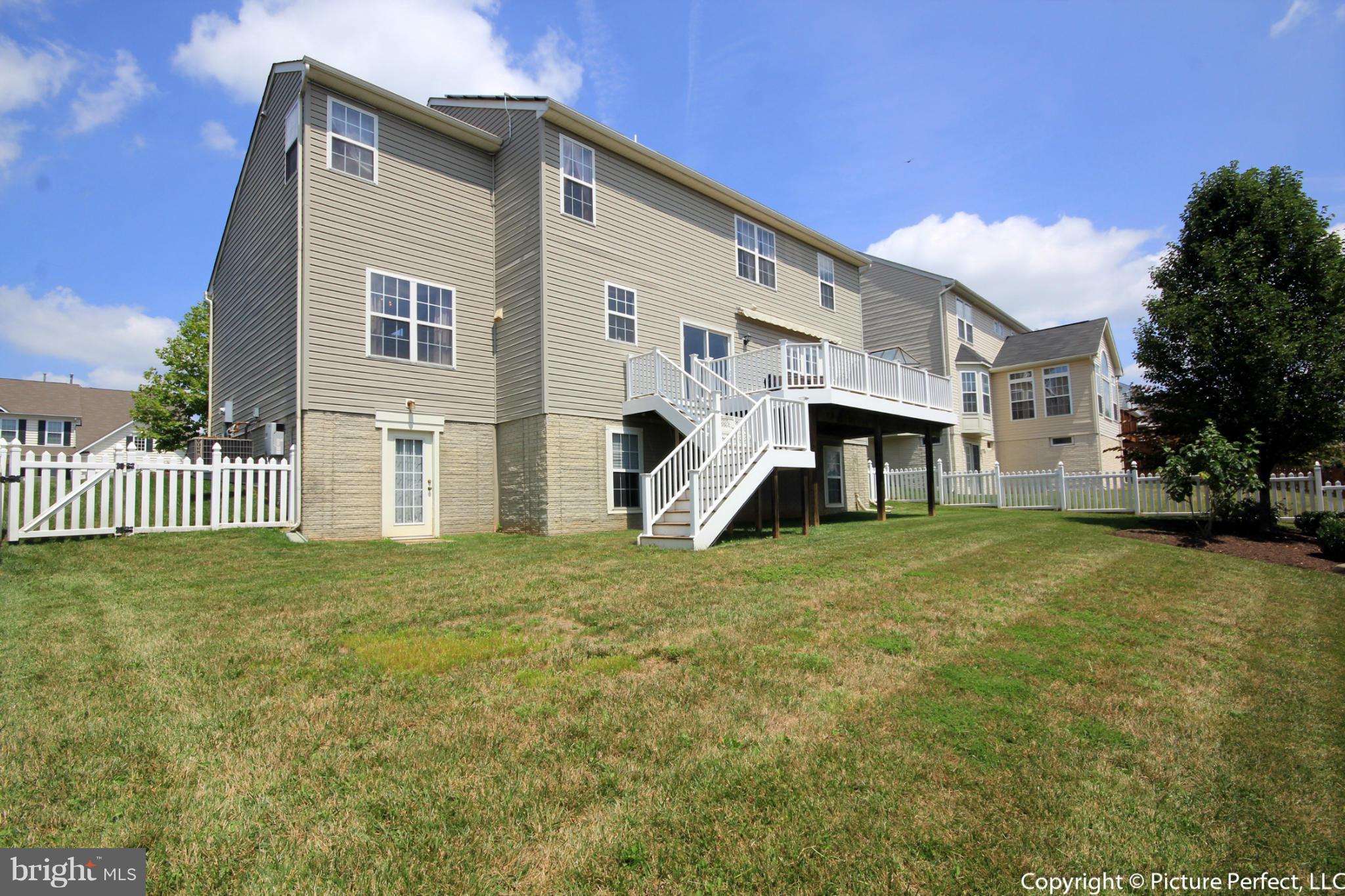 14308 Autumn Crest Road Boyds, MD 20841 - Photo 20 of 21 a view of a house with a yard