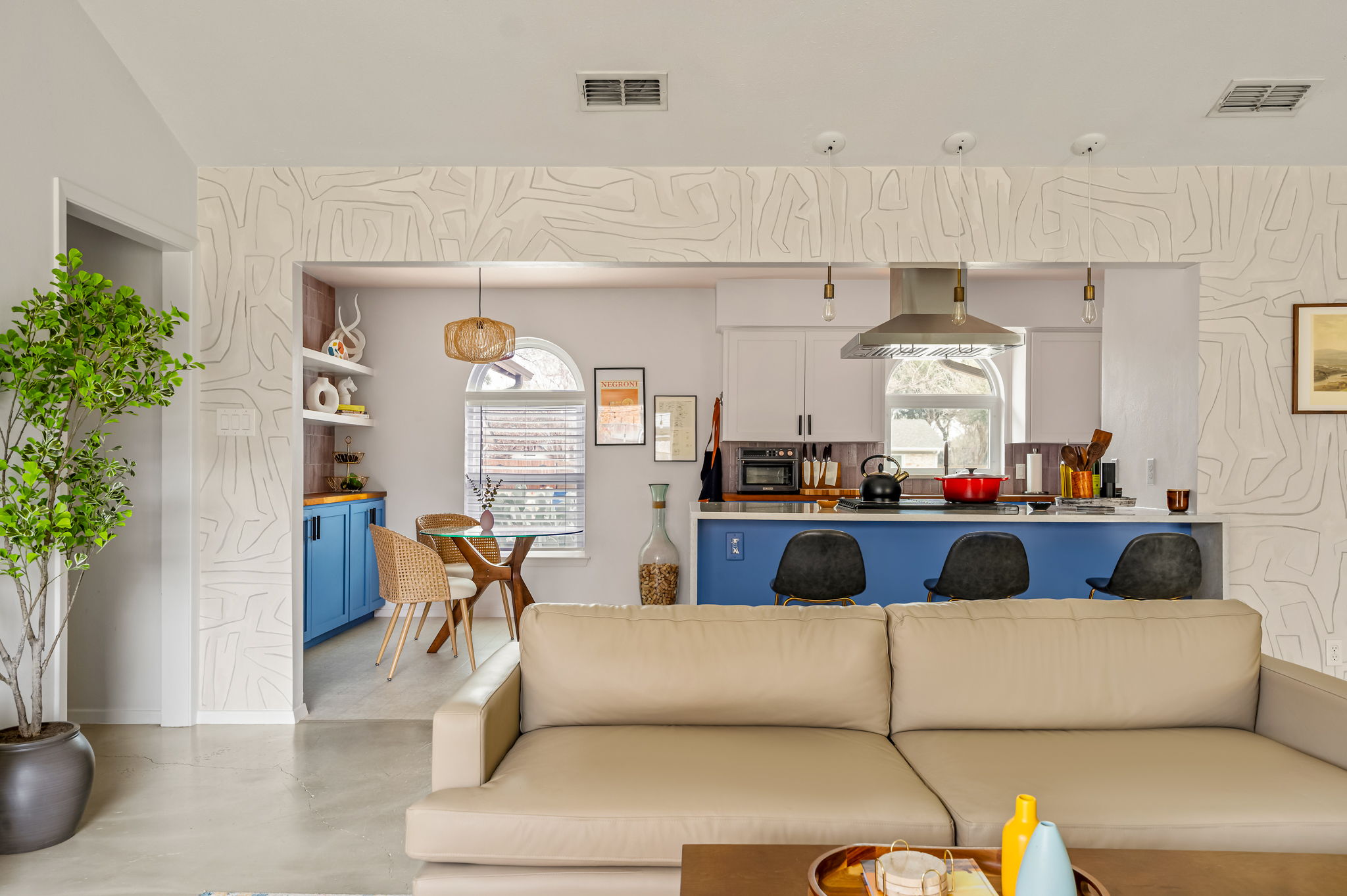 9300 Meadow Vale Austin, TX 78758 - Photo 13 of 37 Living area featuring concrete floors and plenty of natural light