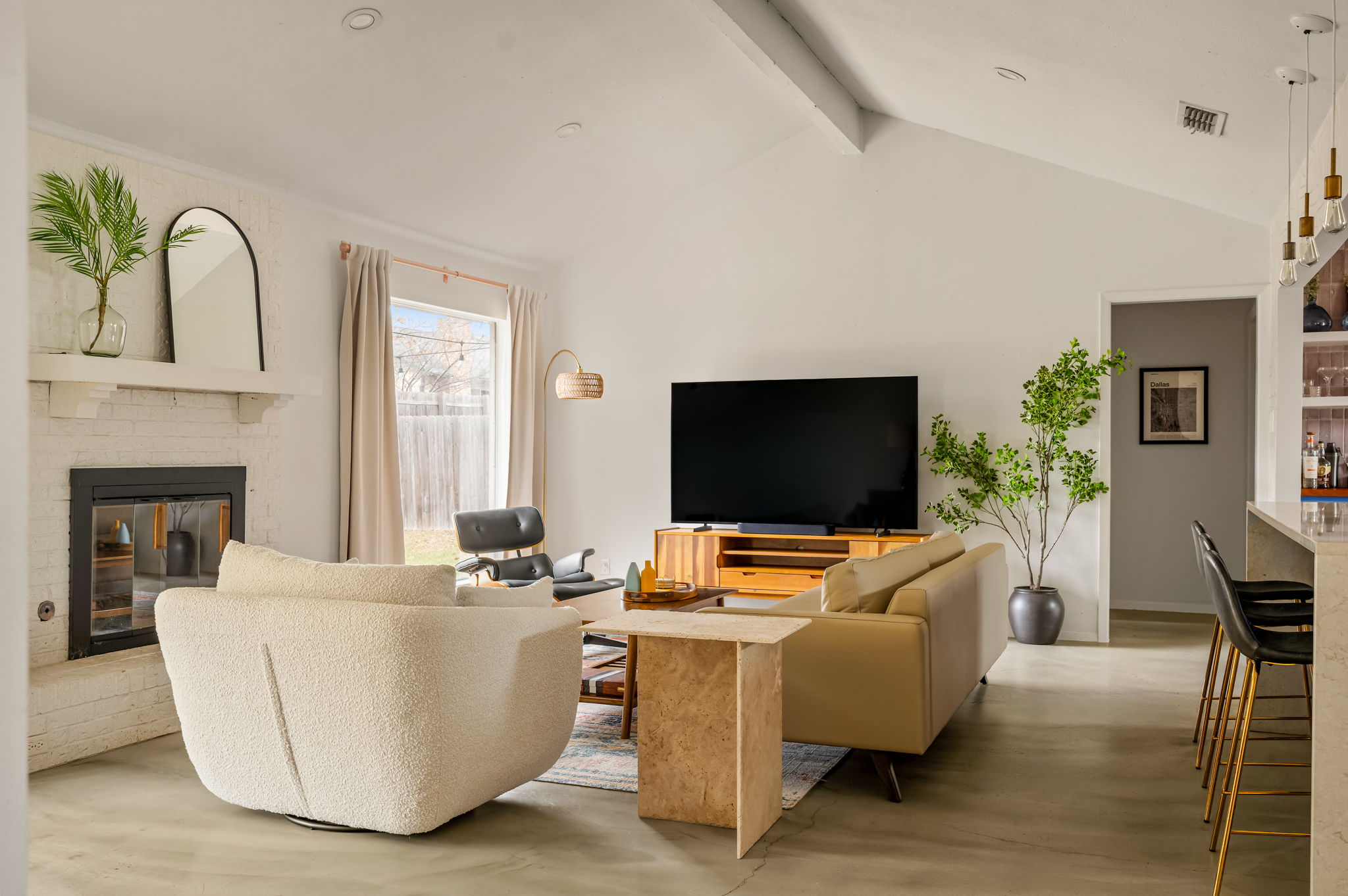 9300 Meadow Vale Austin, TX 78758 - Photo 4 of 37 Living room featuring a brick fireplace and beamed ceiling