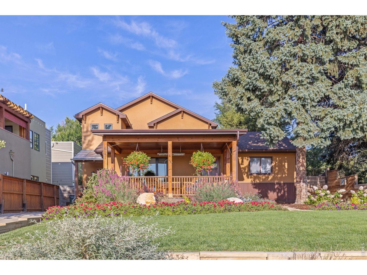 front view of a house with a big yard