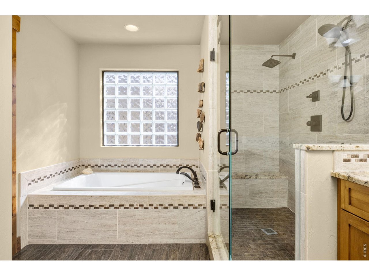621 Wood Street Fort Collins, CO 80521 - Photo 17 of 50 a bathroom with a tub a sink and a window