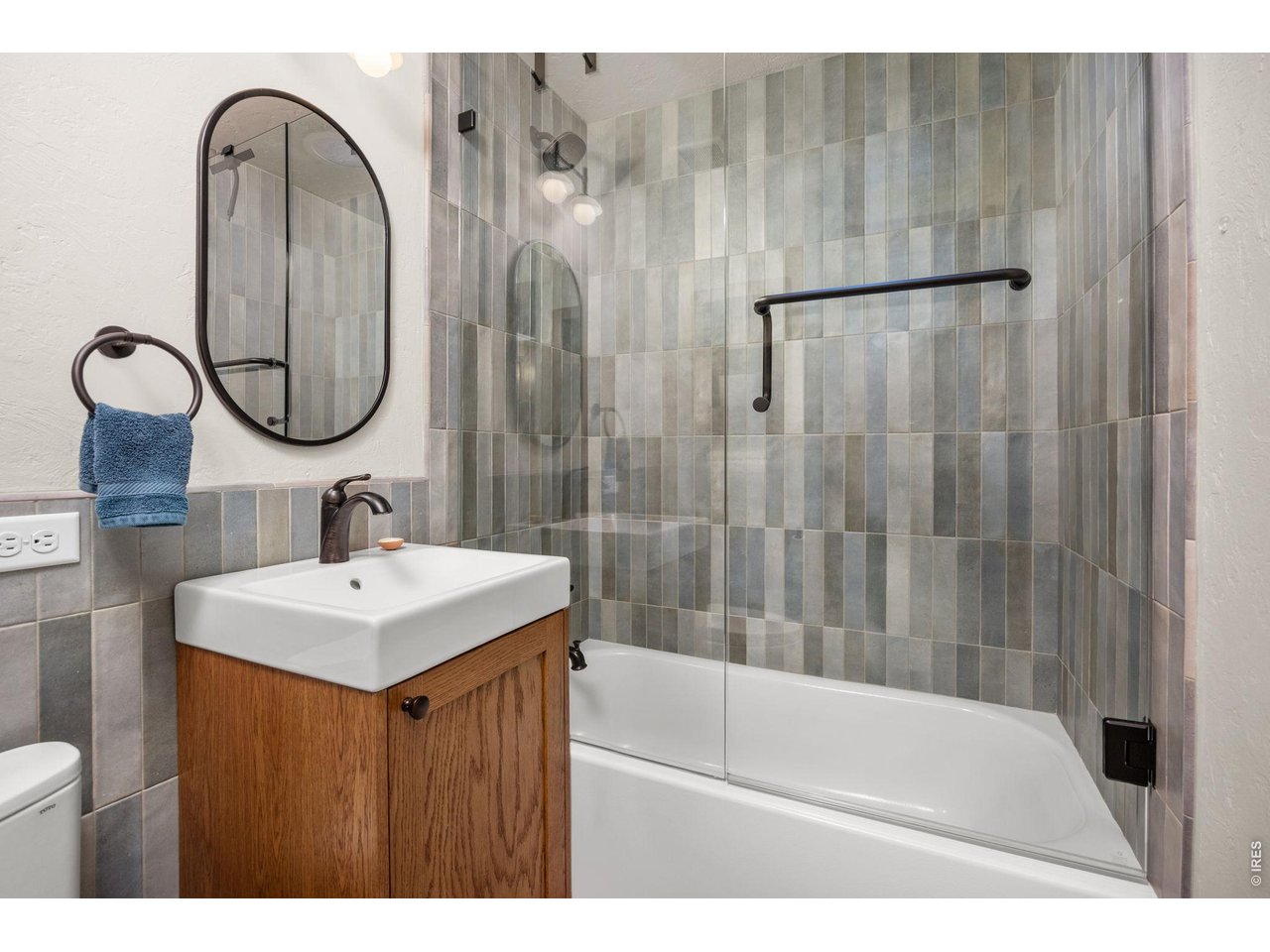 621 Wood Street Fort Collins, CO 80521 - Photo 21 of 50 a bathroom with a sink a toilet and shower