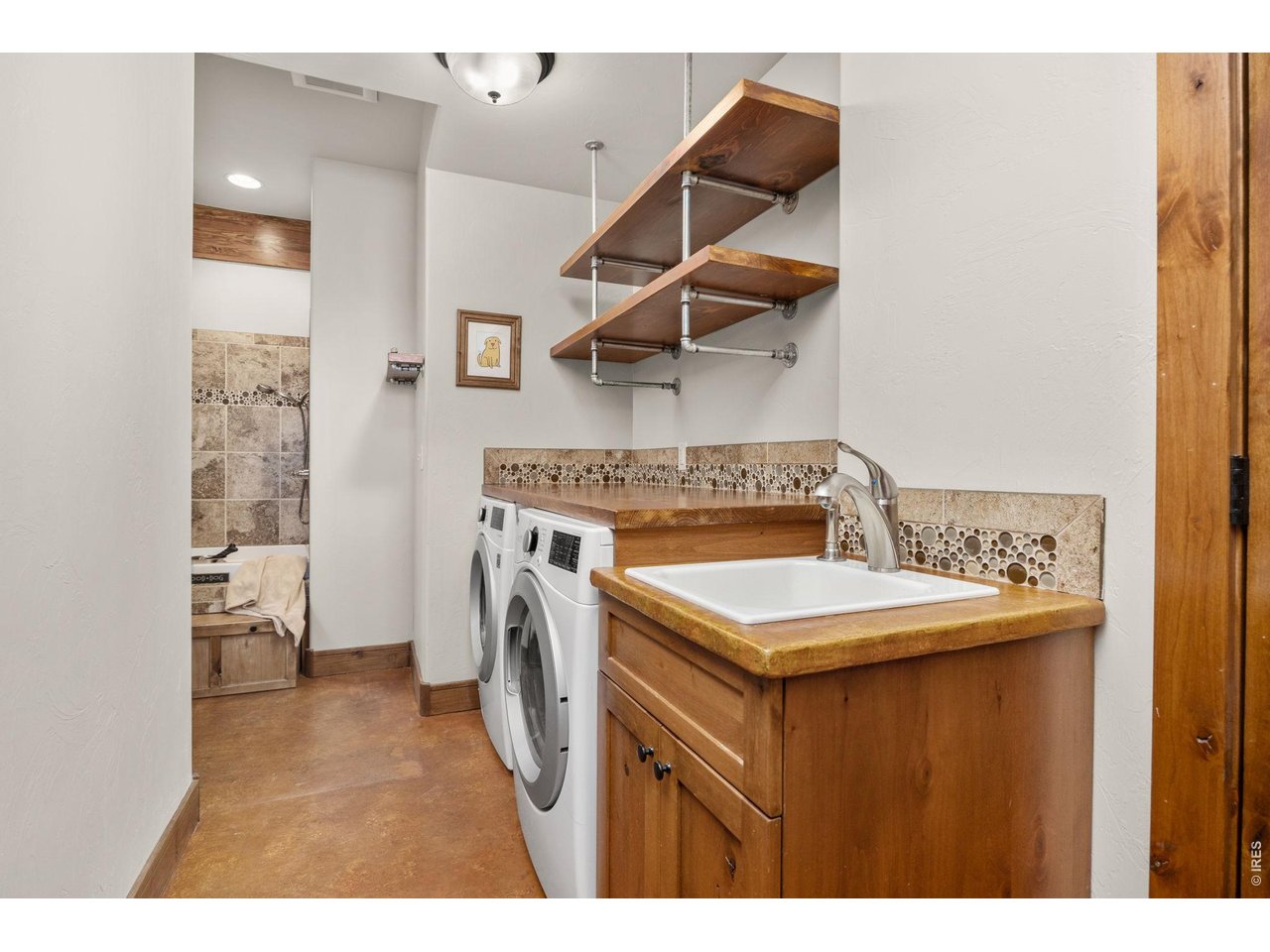 621 Wood Street Fort Collins, CO 80521 - Photo 24 of 50 a utility room with dryer and washer