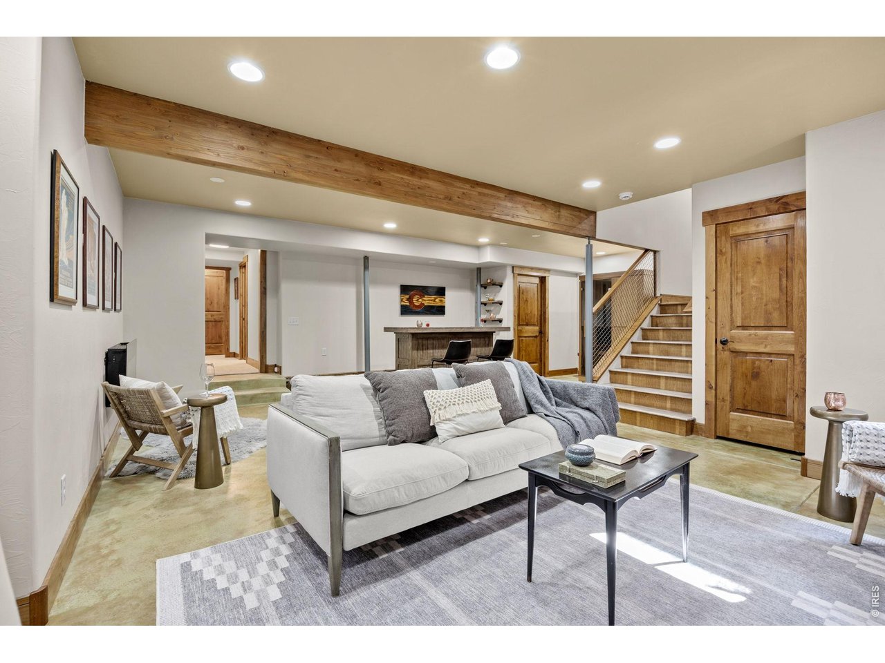 621 Wood Street Fort Collins, CO 80521 - Photo 28 of 50 a living room with furniture and a wooden floor