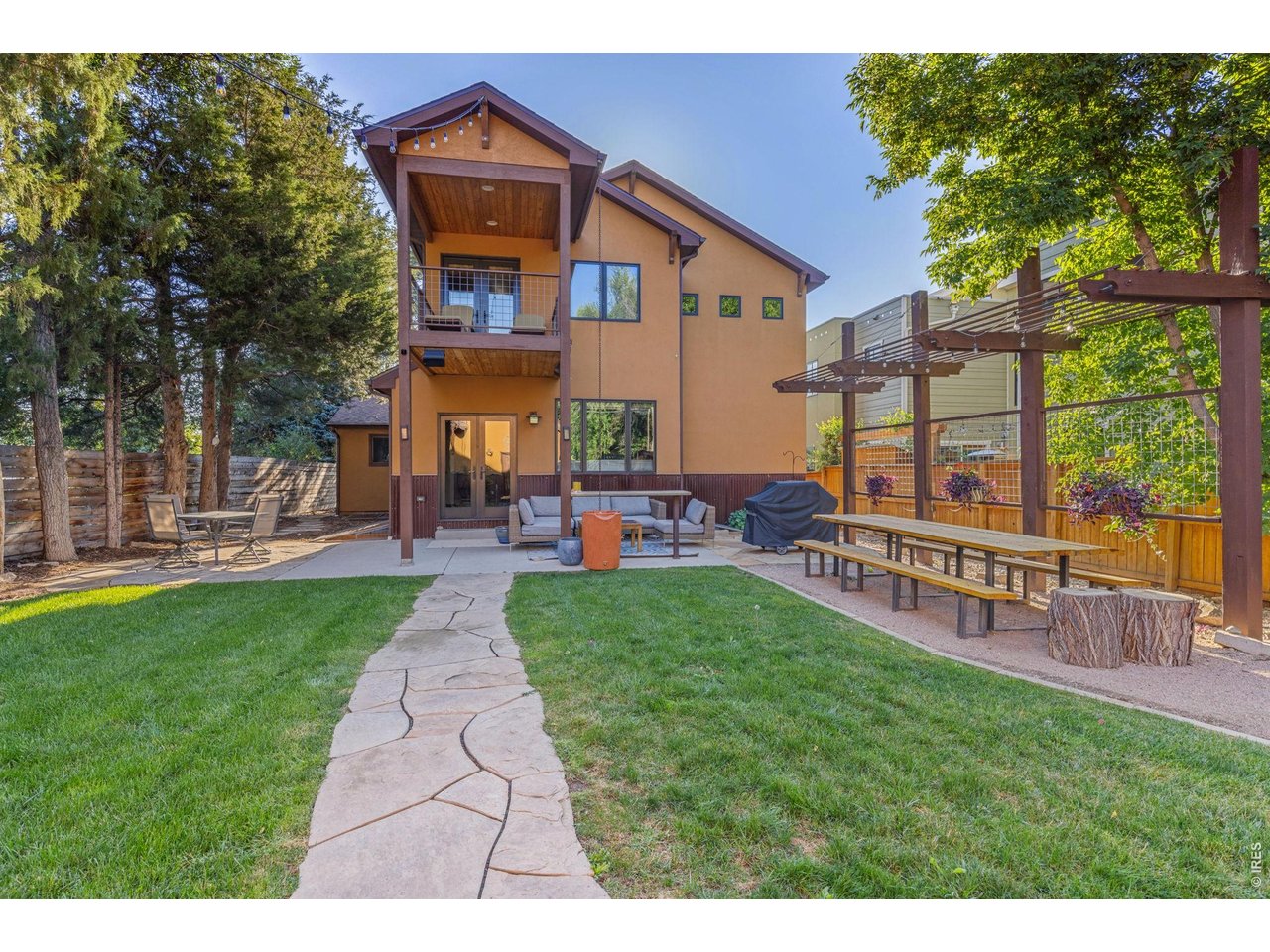 621 Wood Street Fort Collins, CO 80521 - Photo 40 of 50 a view of a house with a back yard