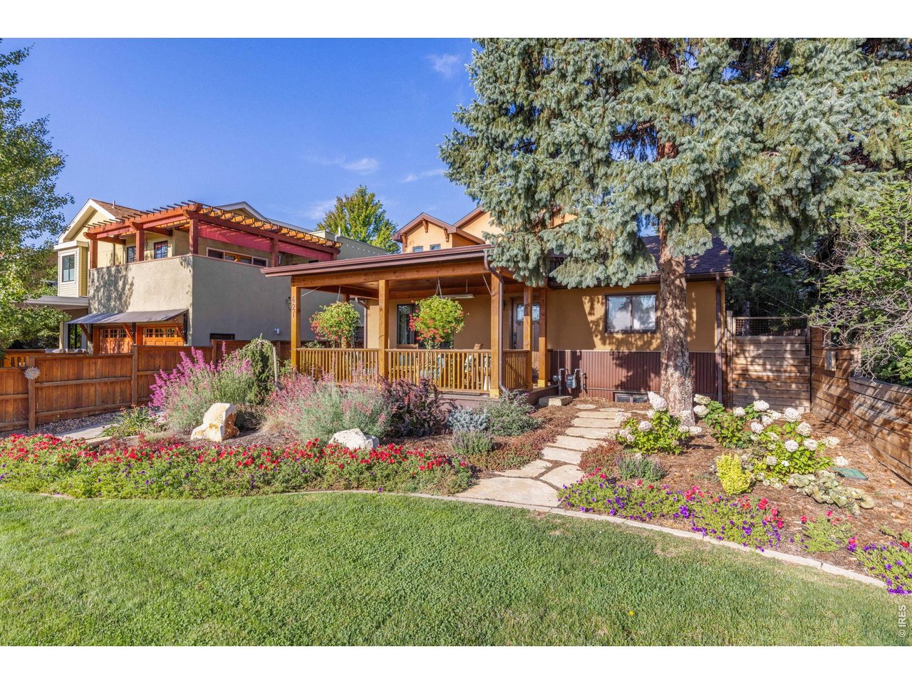 621 Wood Street Fort Collins, CO 80521 - Photo 47 of 50 a front view of a house with a yard