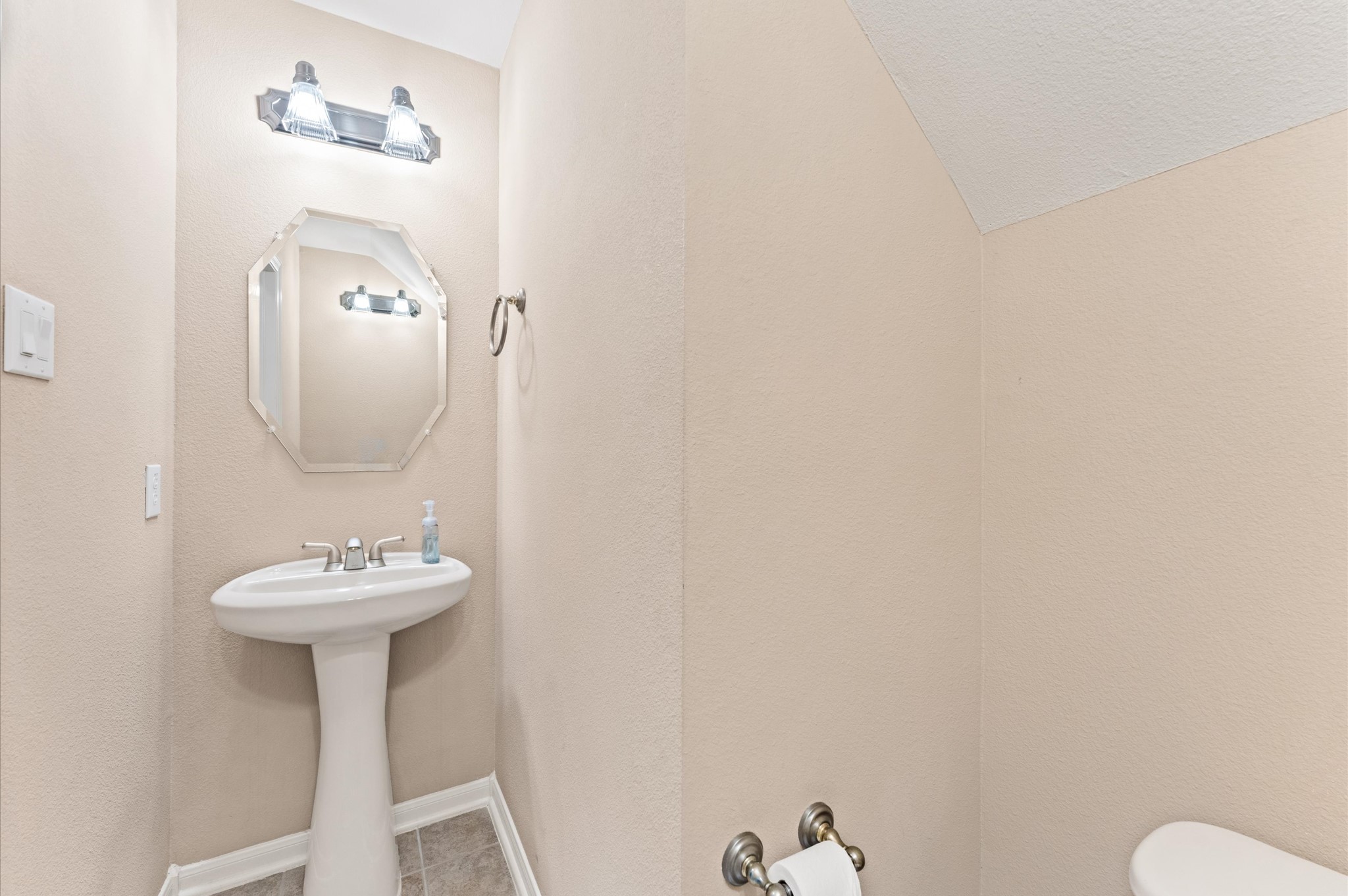 2411 Clippers Square Houston, TX 77058 - Photo 16 of 25 a bathroom with a sink and a mirror