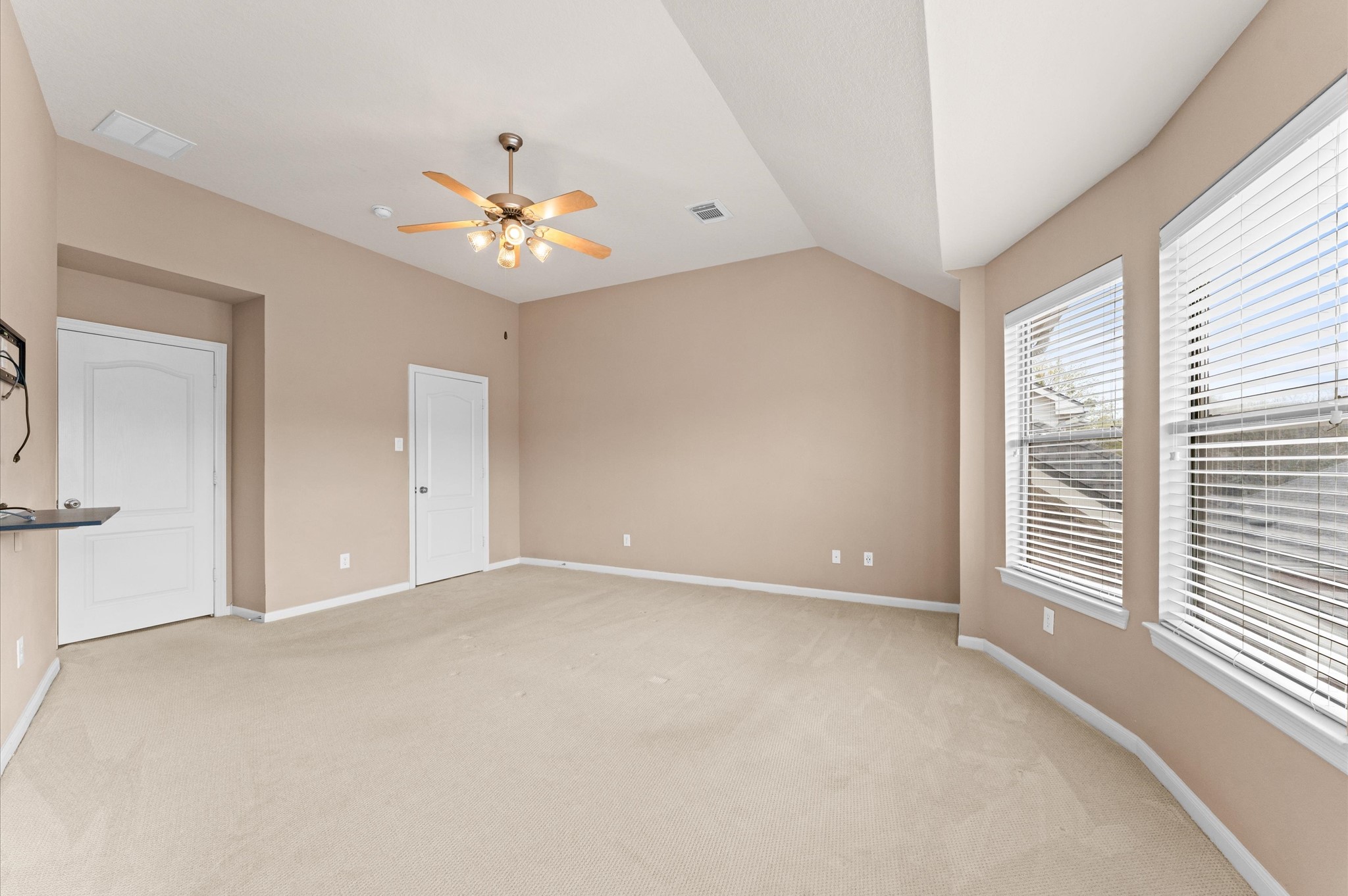 2411 Clippers Square Houston, TX 77058 - Photo 20 of 25 a view of an empty room with a window