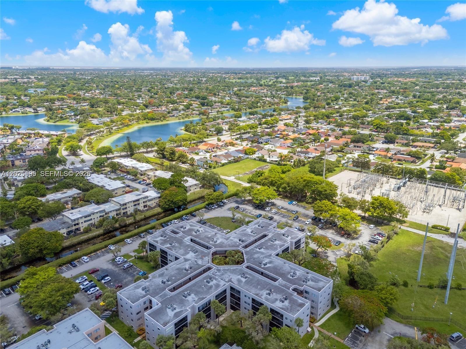 8400 Southwest 133rd Avenue Road, Unit 121 Miami, FL 33183 - Photo 16 of 43 an aerial view of residential houses with outdoor space and ocean