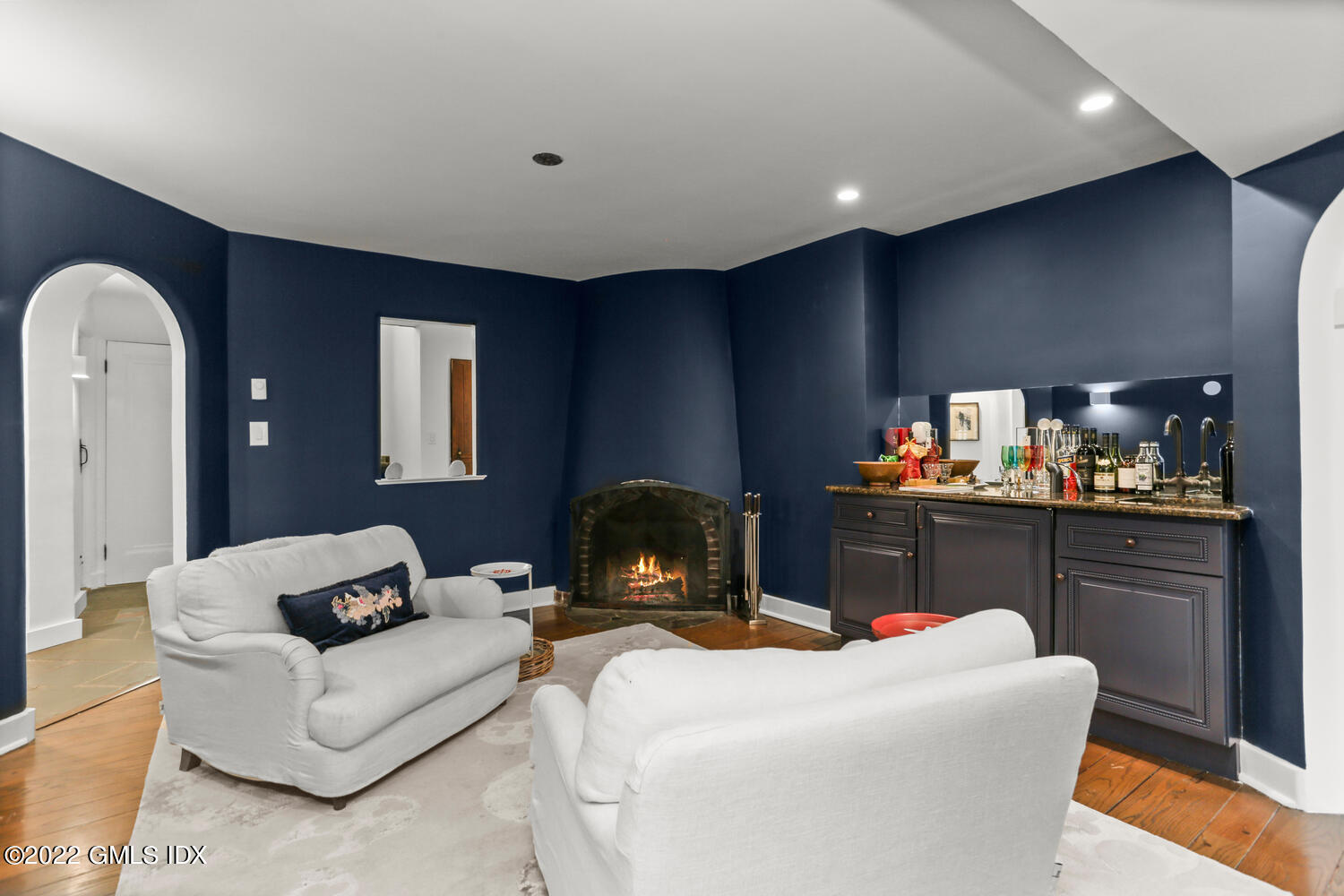 84 Meadow Road Riverside, CT 06878 - Photo 11 of 35 a living room with furniture and a flat screen tv