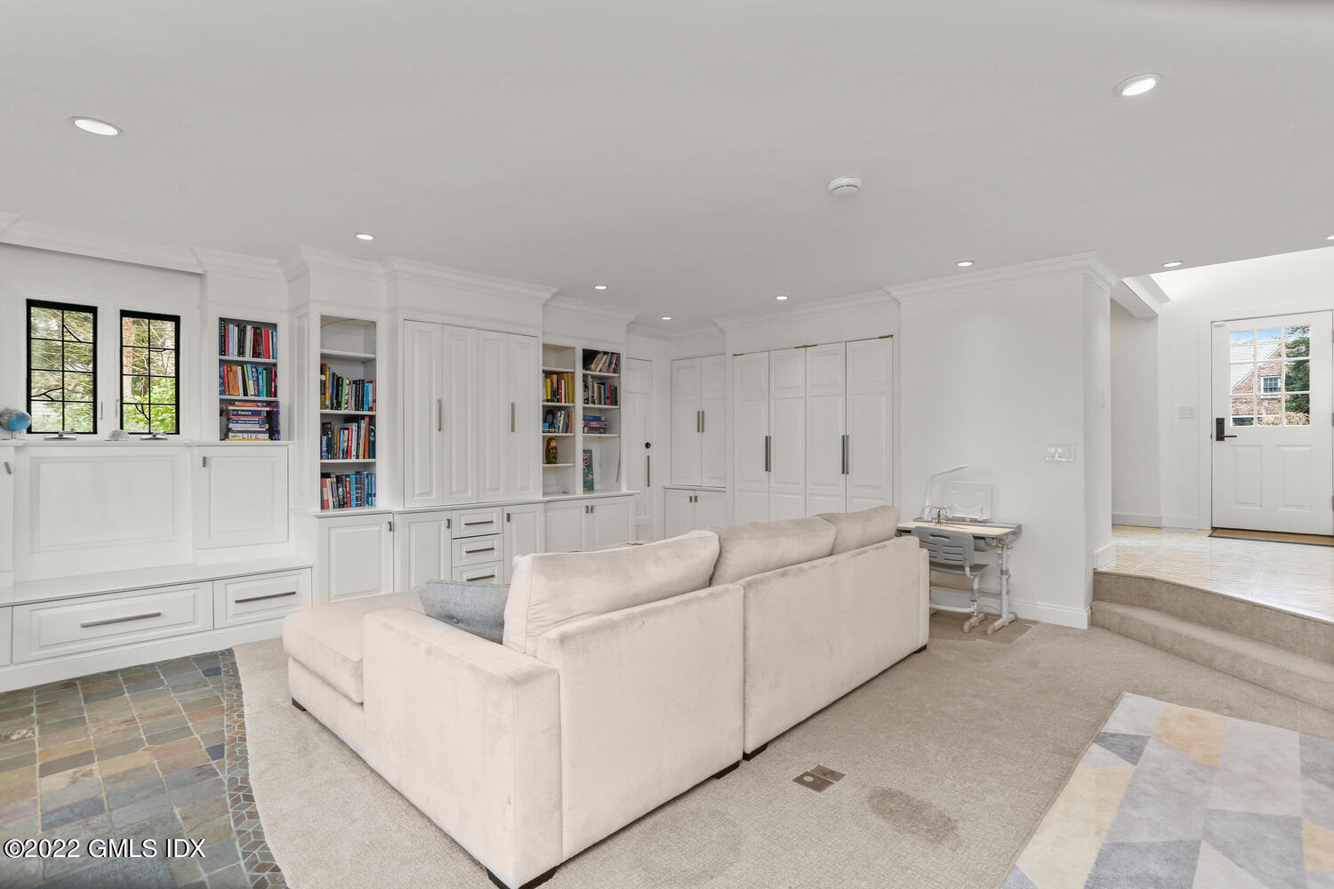 84 Meadow Road Riverside, CT 06878 - Photo 14 of 35 a large white kitchen with white cabinets and a granite counter tops