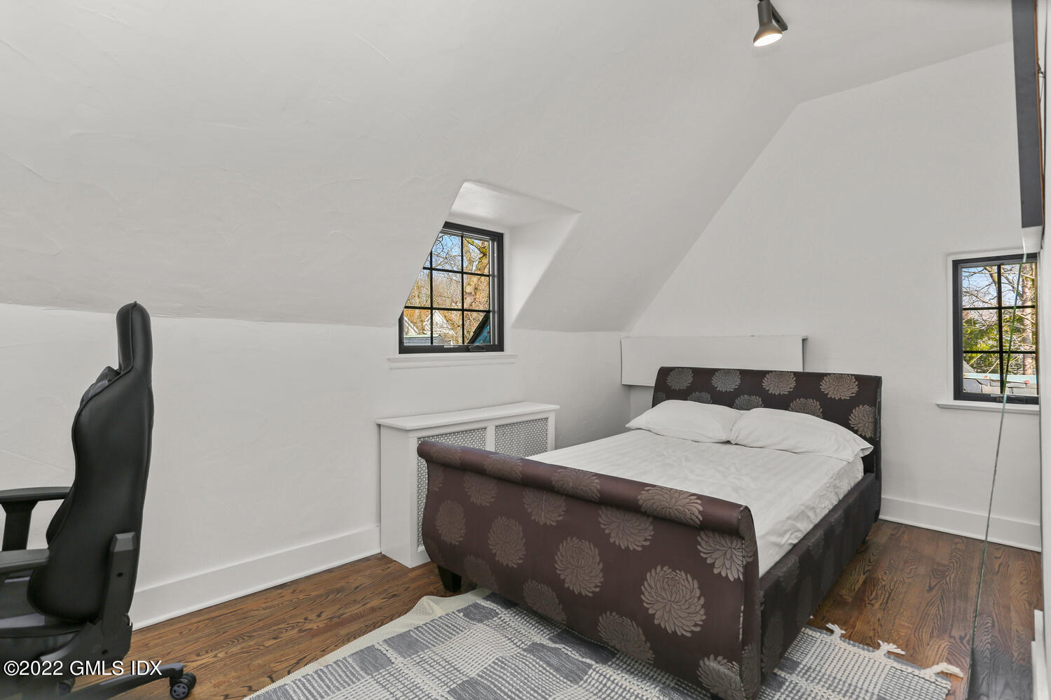 84 Meadow Road Riverside, CT 06878 - Photo 25 of 35 a bedroom with a bed and a window