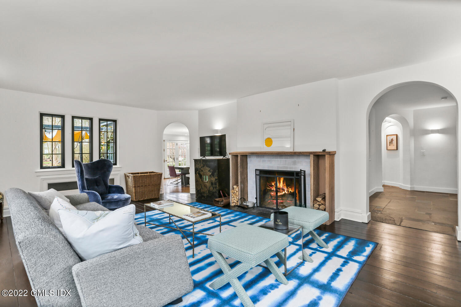 84 Meadow Road Riverside, CT 06878 - Photo 4 of 35 a living room with furniture and a fireplace