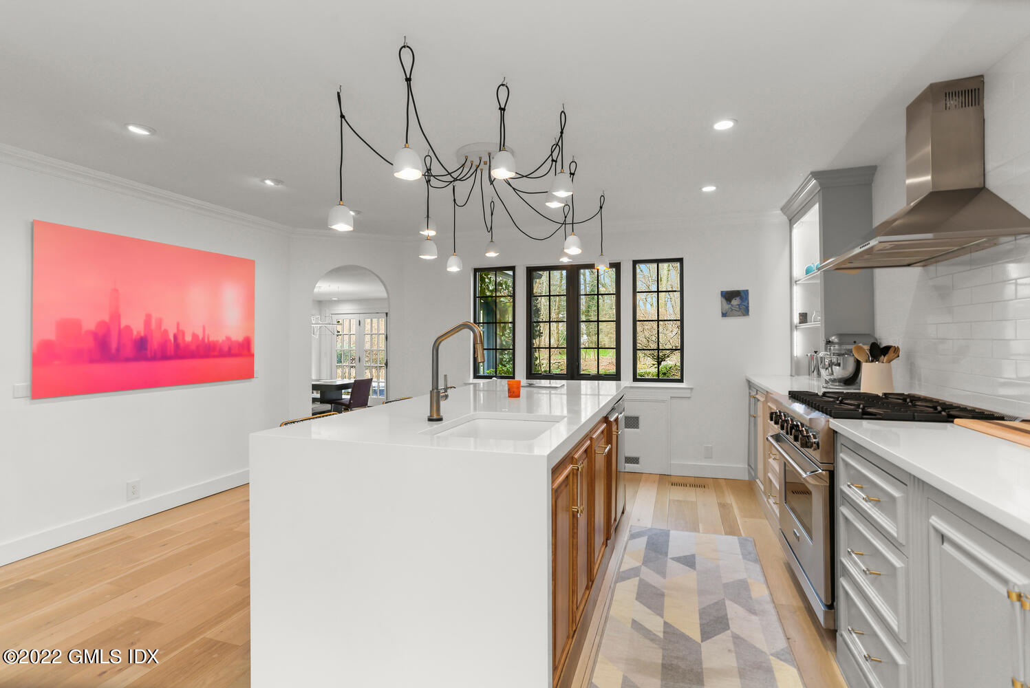 84 Meadow Road Riverside, CT 06878 - Photo 8 of 35 a open kitchen with stainless steel appliances granite countertop a sink stove and refrigerator