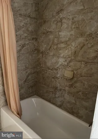 a bathroom with a bathtub