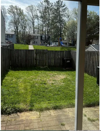 a view of a backyard with a small yard