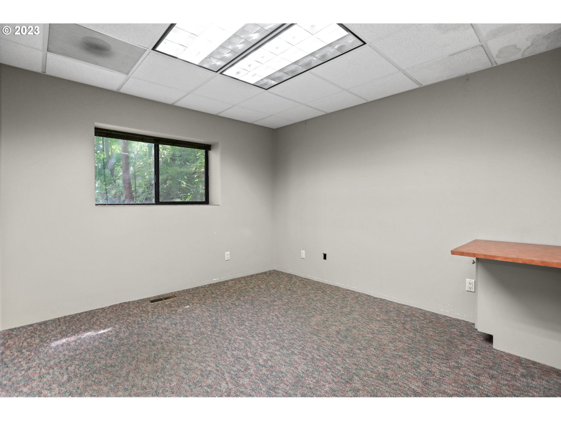 1237 State Street Hood River, OR 97031 - Photo 31 of 42 an empty room with a window