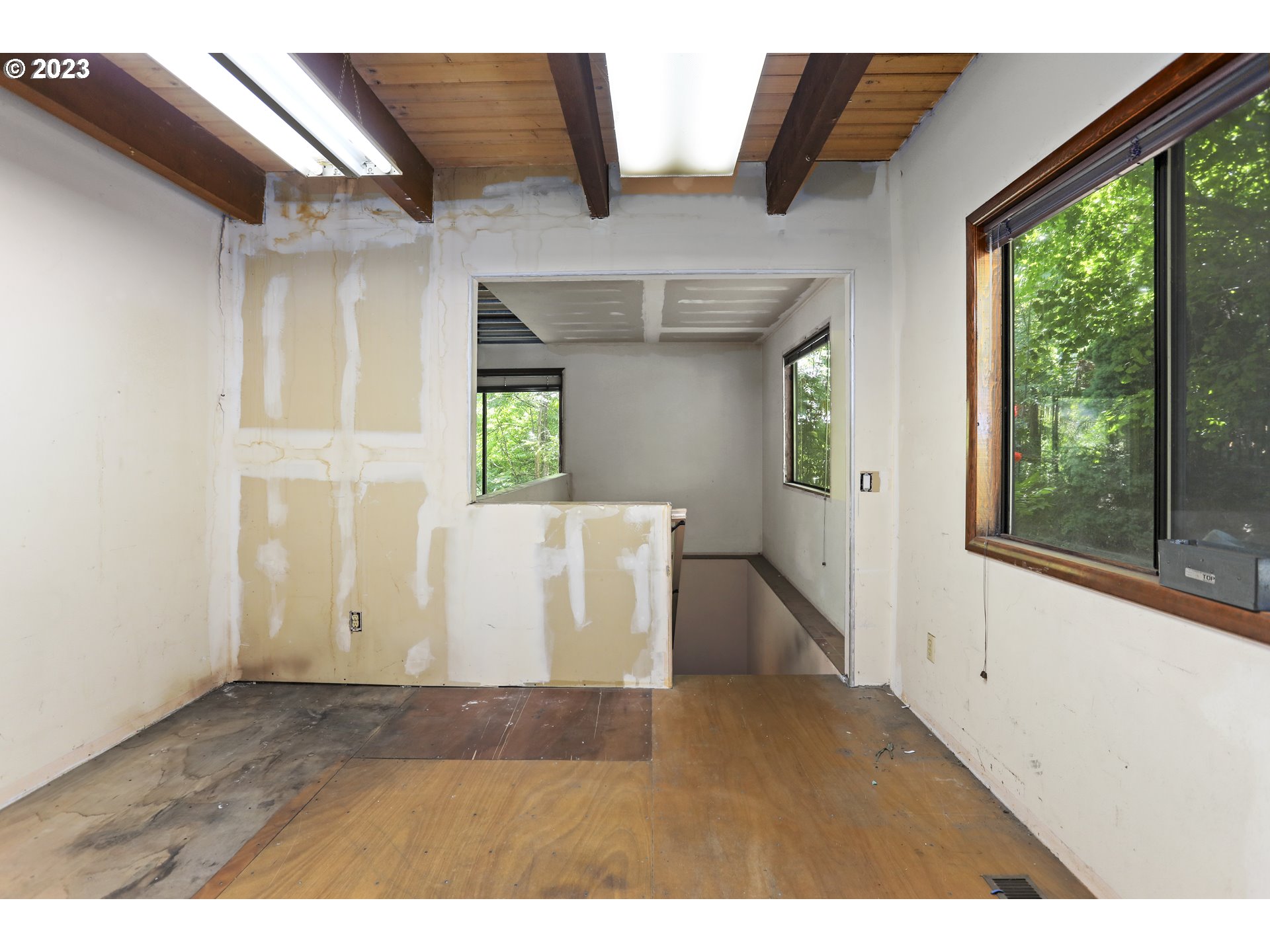 1237 State Street Hood River, OR 97031 - Photo 4 of 42 a view interior of a house with wooden floor and windows