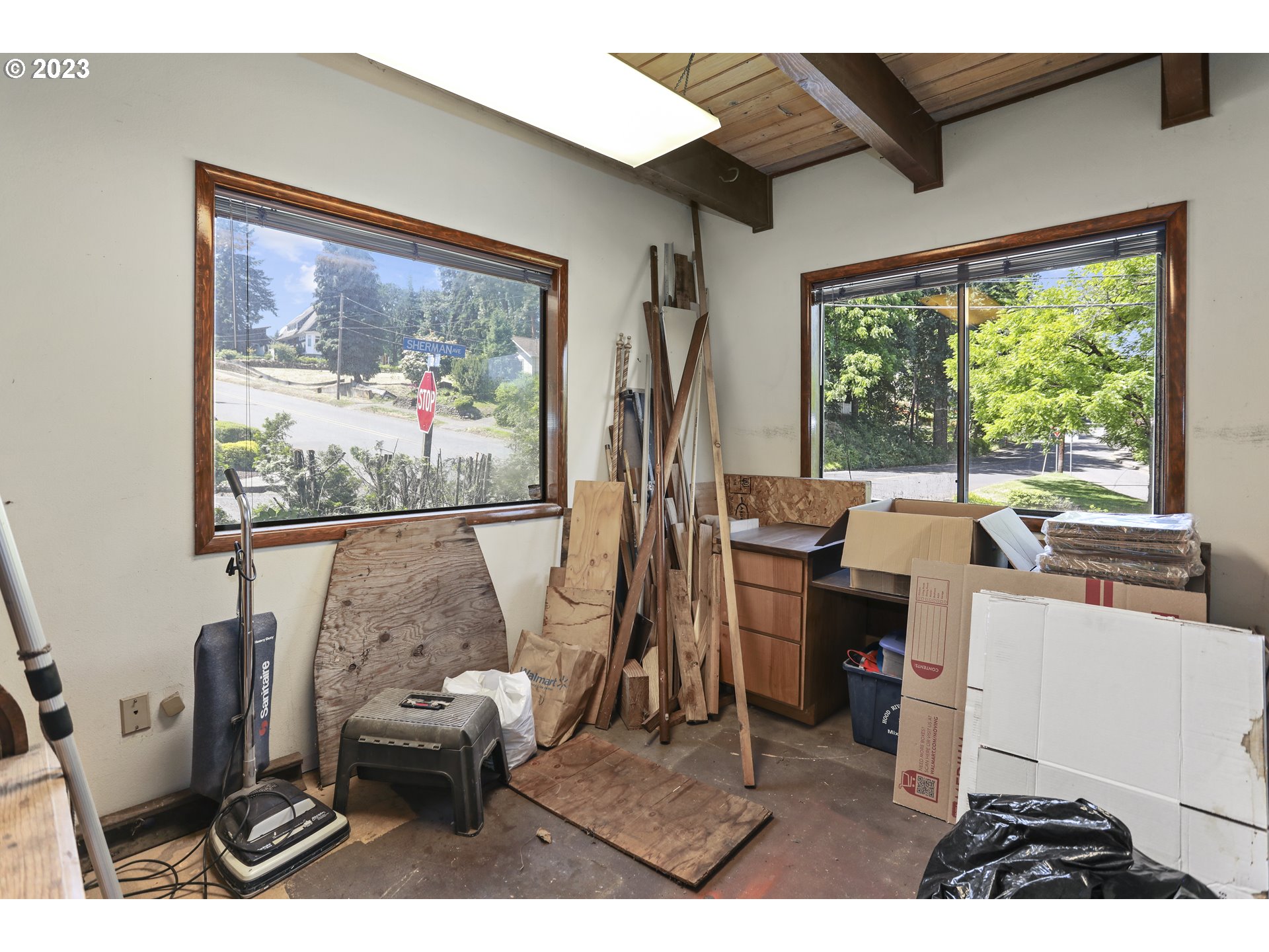 1237 State Street Hood River, OR 97031 - Photo 6 of 42 a living room with furniture a window and a flat screen tv