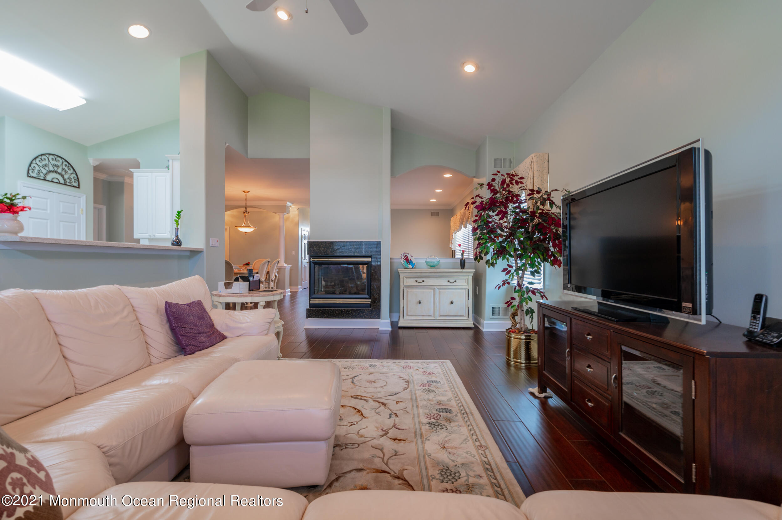 4 Chandon Road Manchester Township, NJ 08759 - Photo 13 of 38 a living room with furniture and a flat screen tv
