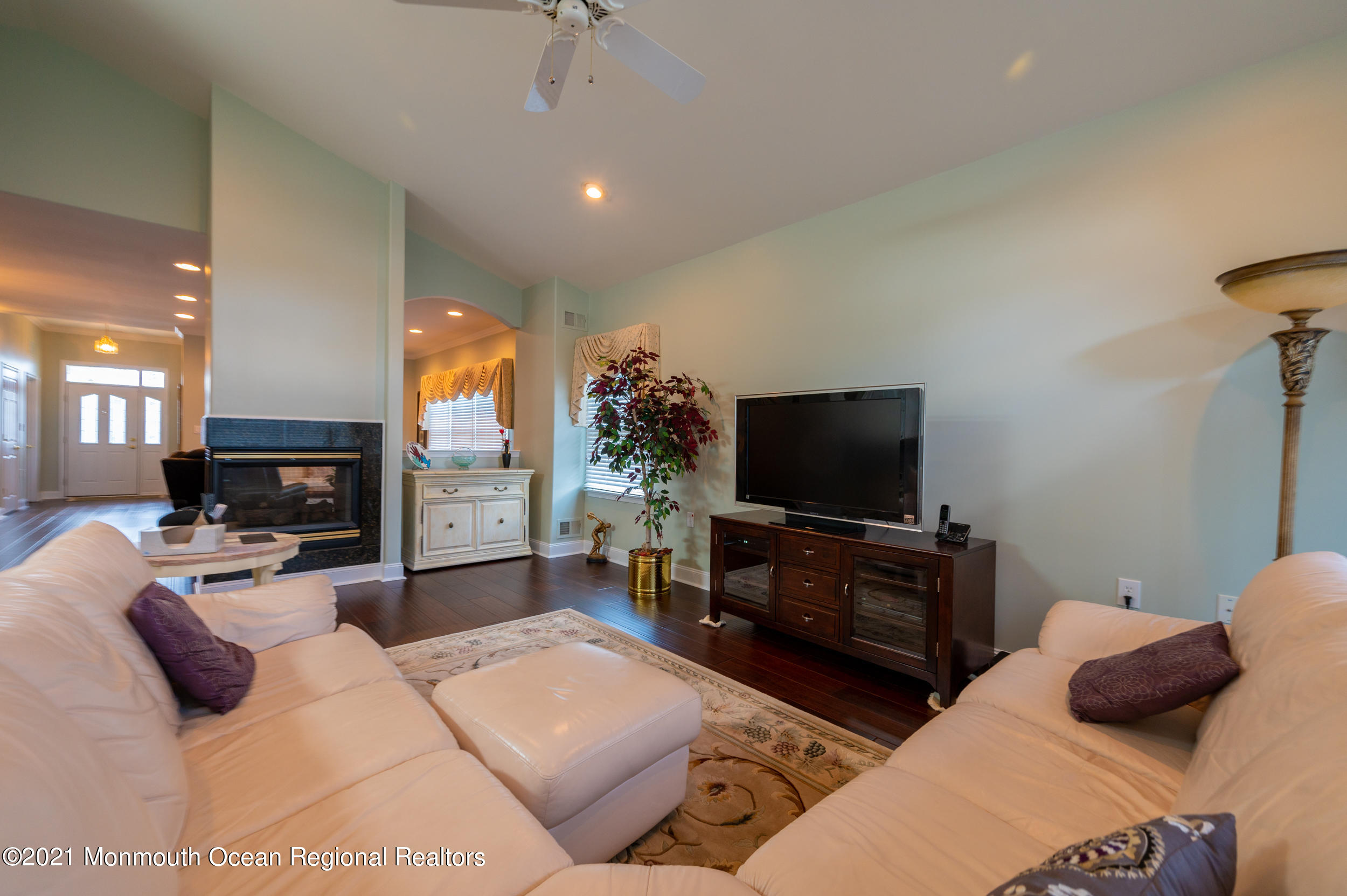 4 Chandon Road Manchester Township, NJ 08759 - Photo 14 of 38 a living room with furniture and a flat screen tv