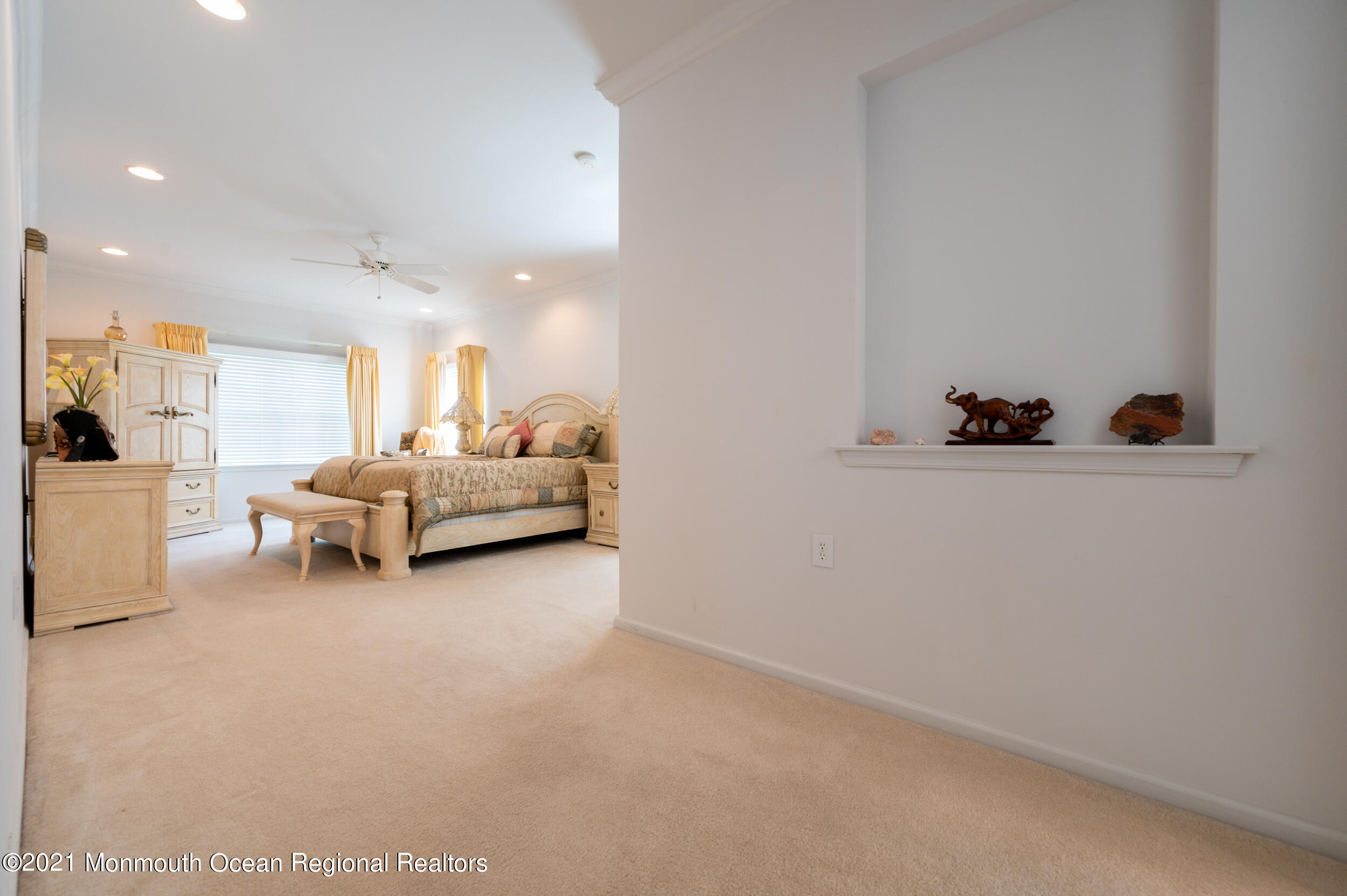 4 Chandon Road Manchester Township, NJ 08759 - Photo 21 of 38 a living room with furniture and a table