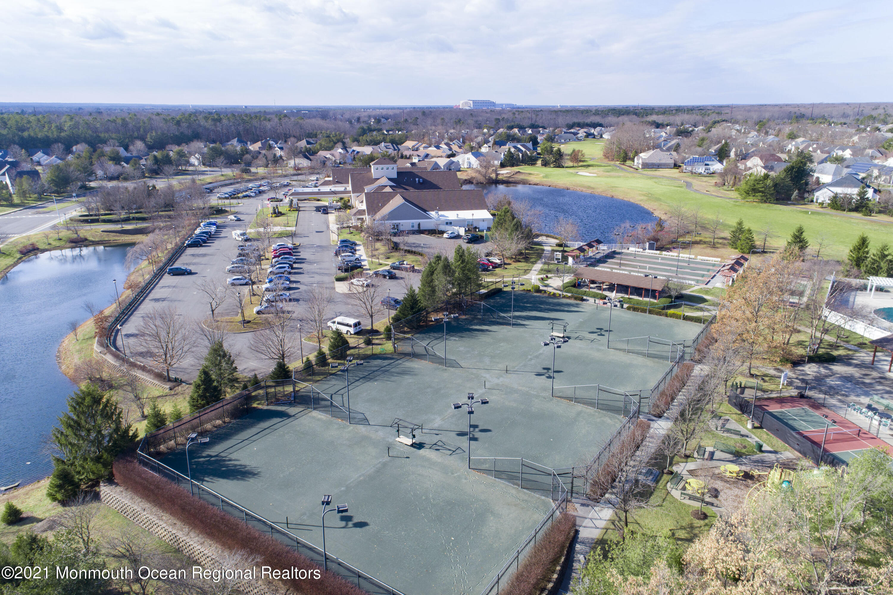 4 Chandon Road Manchester Township, NJ 08759 - Photo 35 of 38 an aerial view of a house with a swimming pool