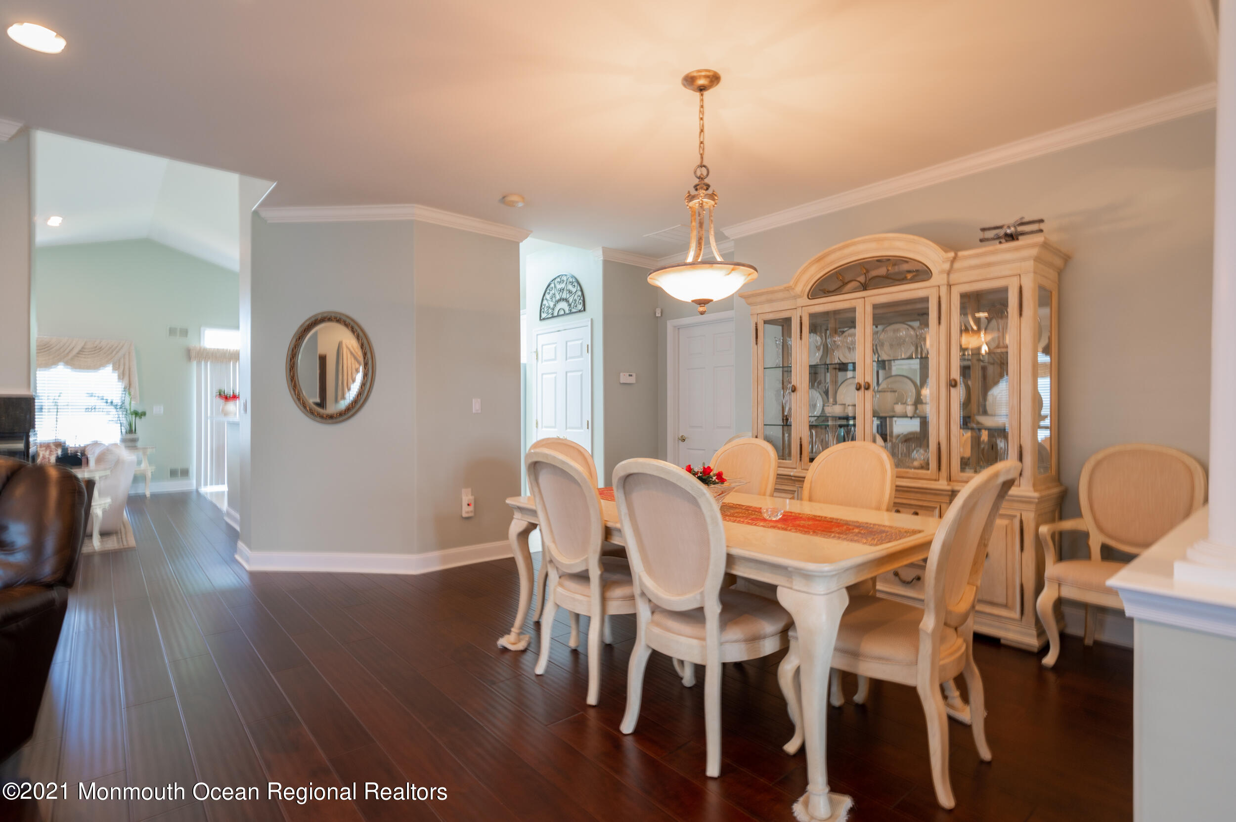 4 Chandon Road Manchester Township, NJ 08759 - Photo 10 of 38 a view of a dining room with furniture wooden floor and chandelier