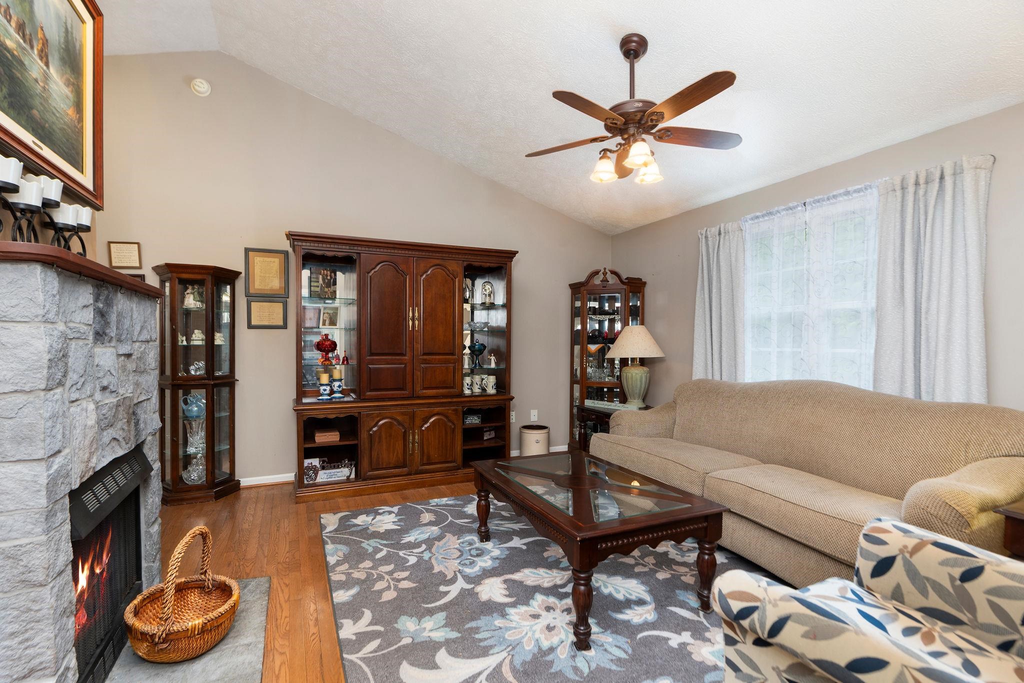 516 Estaline Valley Road Craigsville, VA 24430 - Photo 26 of 75 a living room with furniture and a fireplace
