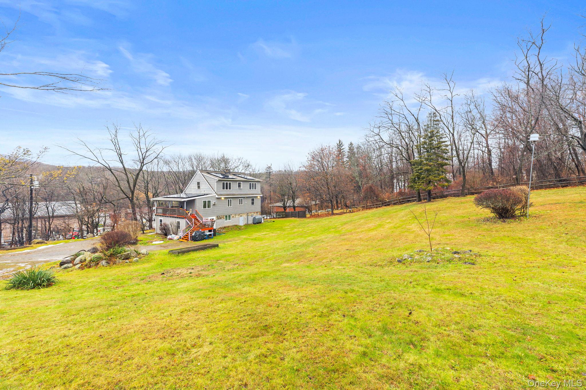 11 Cross Creek Road Cold Spring, NY 10516 - Photo 10 of 43 View of grassy yard featuring stairs