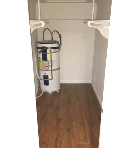 a view of storage and utility room with a sink