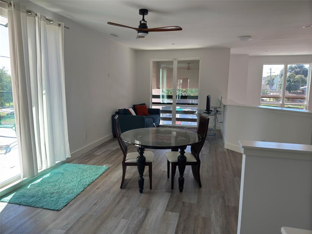 9497 Timberleaf Drive Dallas, TX 75243 - Photo 5 of 10 a view of a dining room with furniture and window