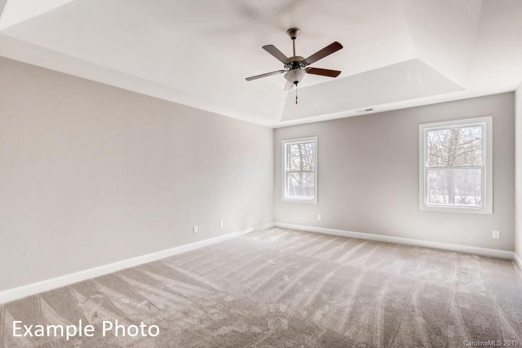 5148 Mill Creek Road, Unit 4 Clover, SC 29710 - Photo 6 of 12 a view of a big room with wooden floor and windows