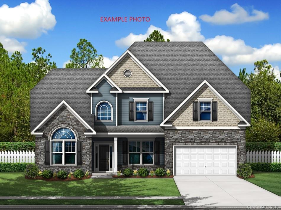 5148 Mill Creek Road, Unit 4 Clover, SC 29710 - Photo 10 of 12 a front view of a house with a yard