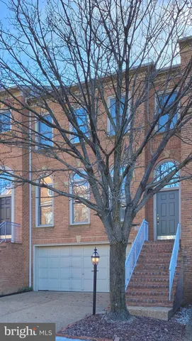a front view of a house with stairs