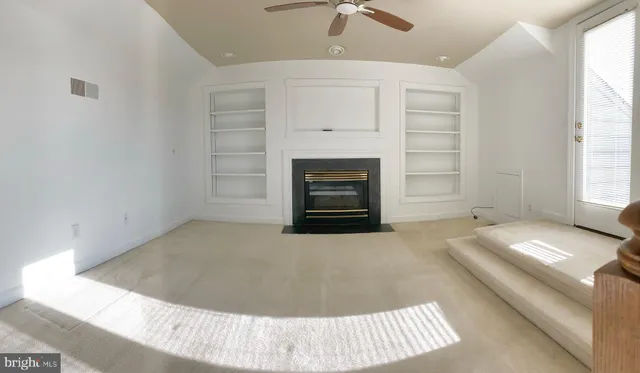 a view of a livingroom with a fireplace