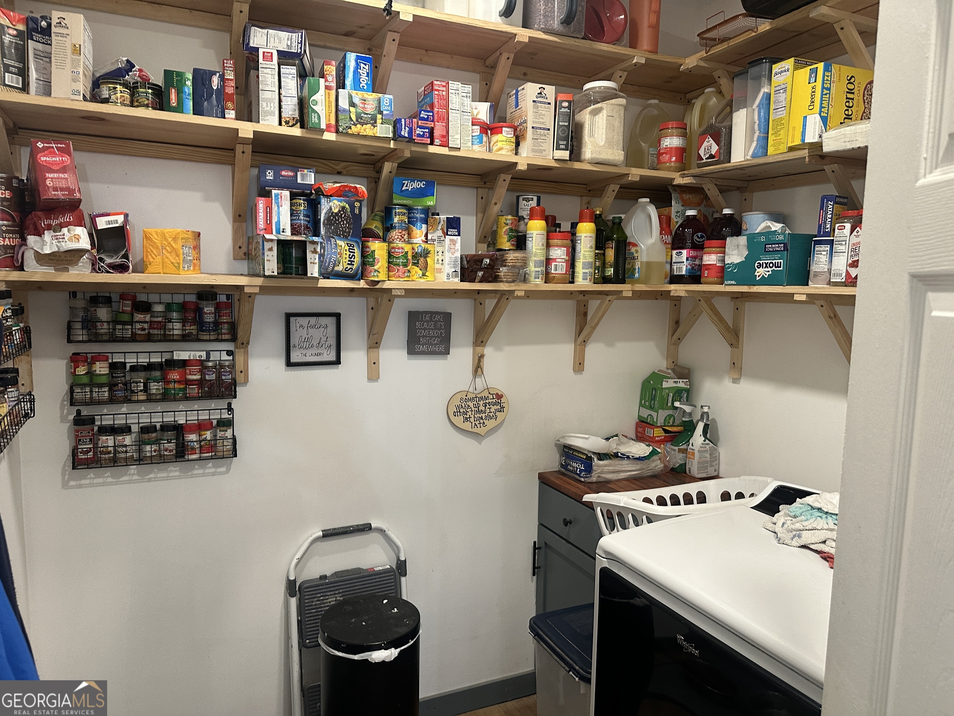 925 Cleary Road Brooklet, GA 30415 - Photo 22 of 48 a room with lots of bottles of alcohol