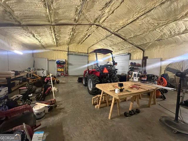 a room with lots of gym equipment