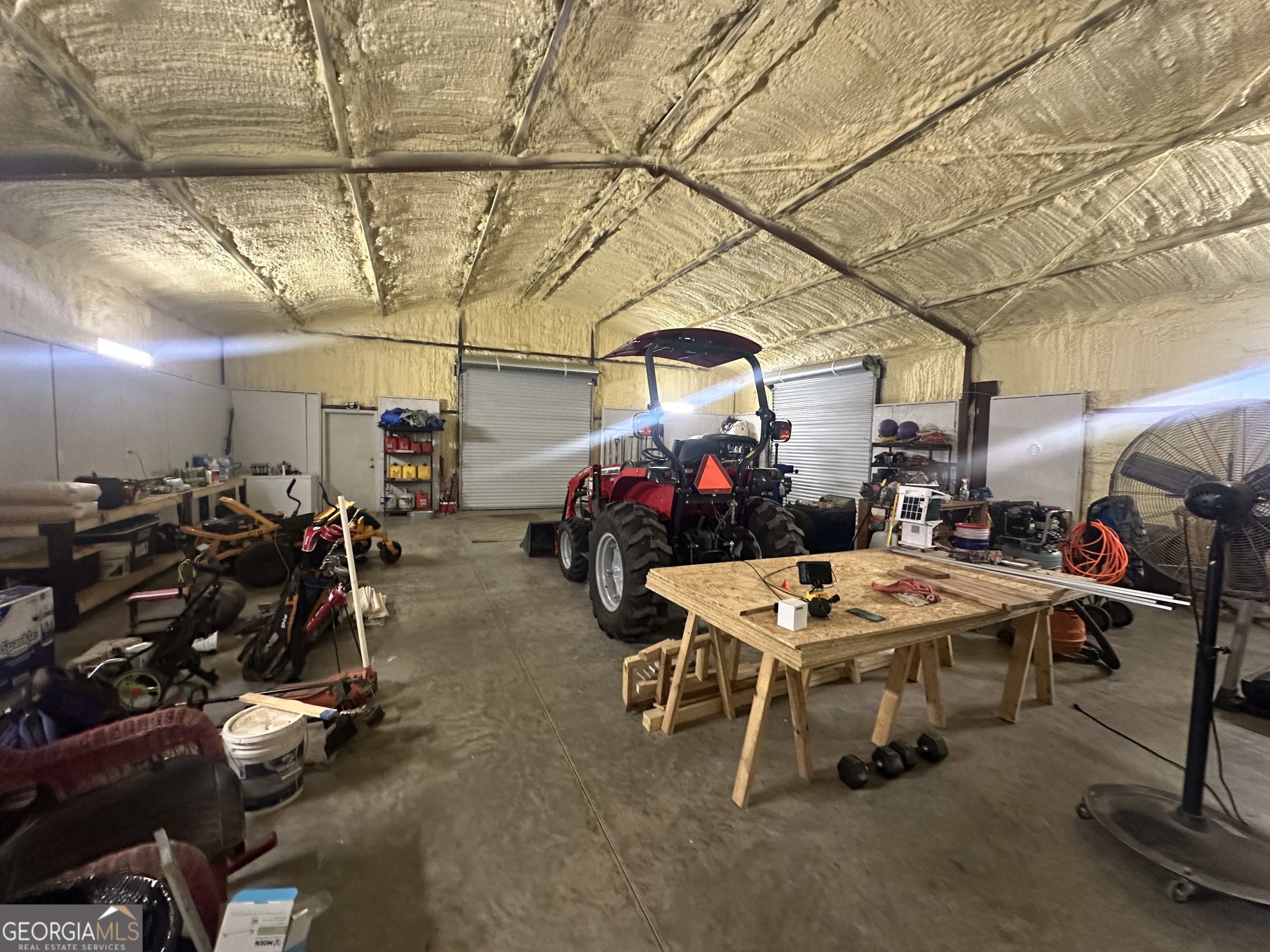 925 Cleary Road Brooklet, GA 30415 - Photo 23 of 48 a room with lots of gym equipment