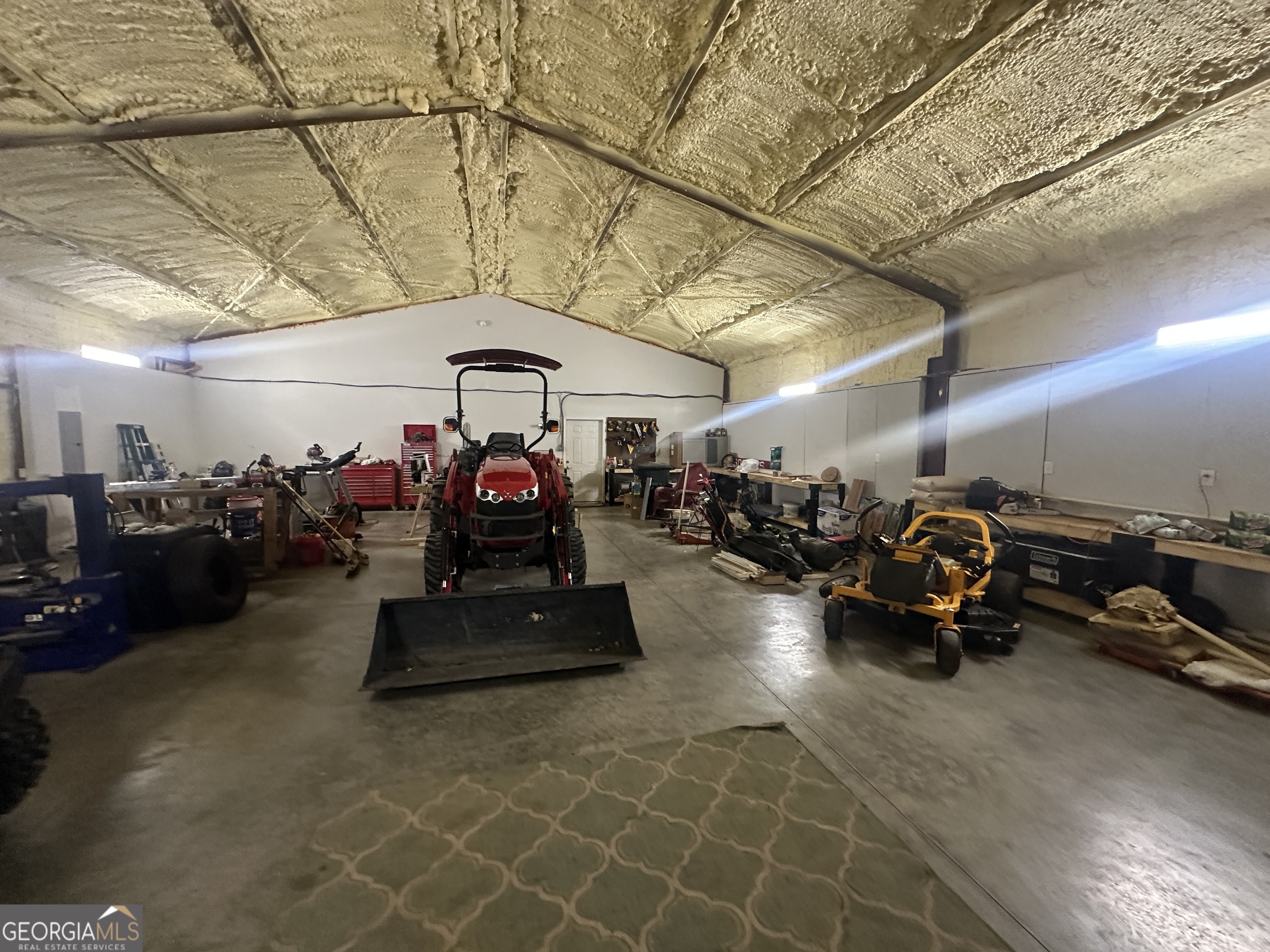 925 Cleary Road Brooklet, GA 30415 - Photo 25 of 48 a view of a garage with cars