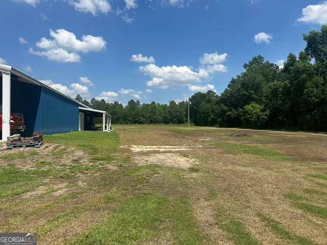a view of outdoor space and yard