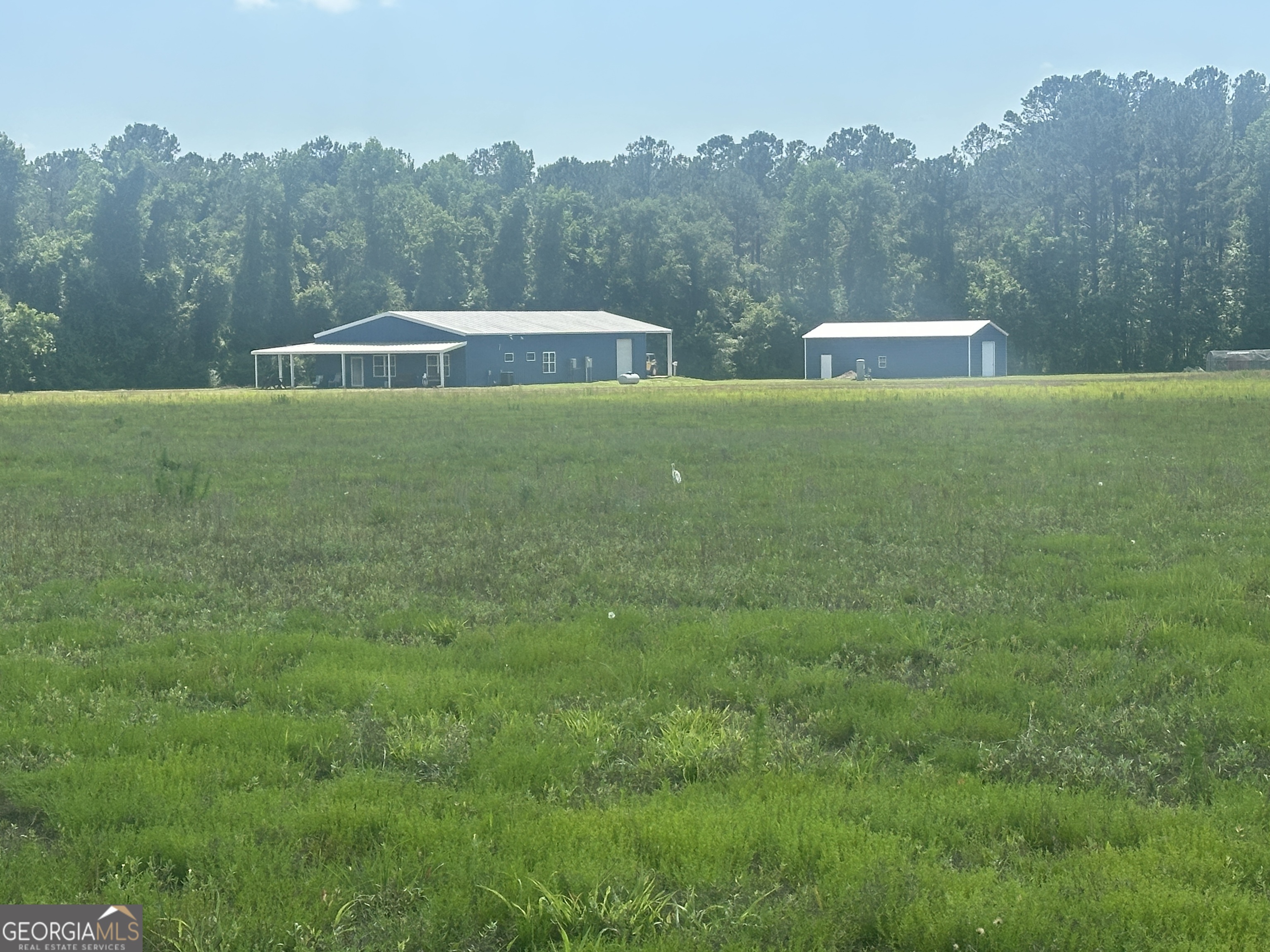 925 Cleary Road Brooklet, GA 30415 - Photo 48 of 48 a view of a house with a yard
