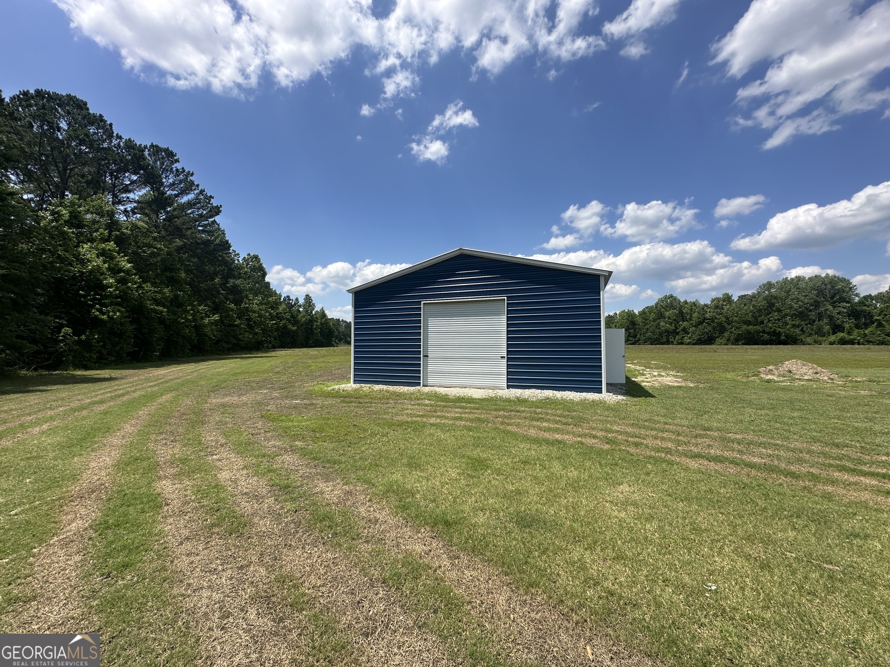 925 Cleary Road Brooklet, GA 30415 - Photo 6 of 48 a view of outdoor space and yard
